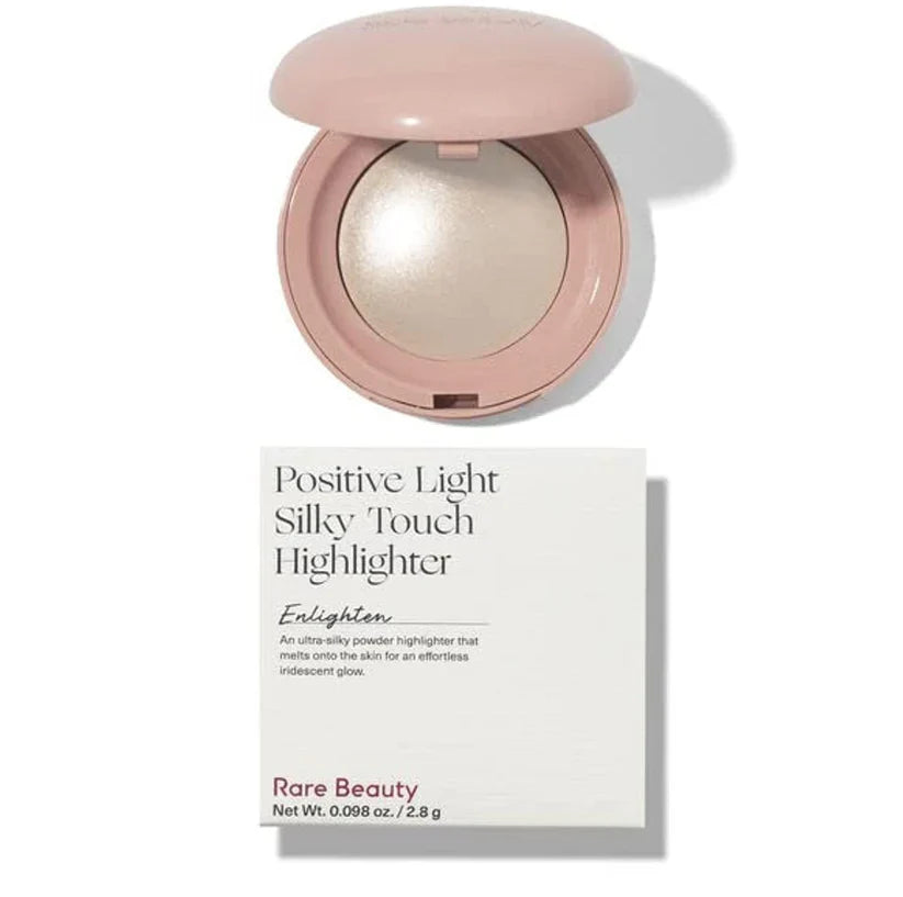Rare Beauty Positive Light Silky Touch Highlighter with packaging on a white background
